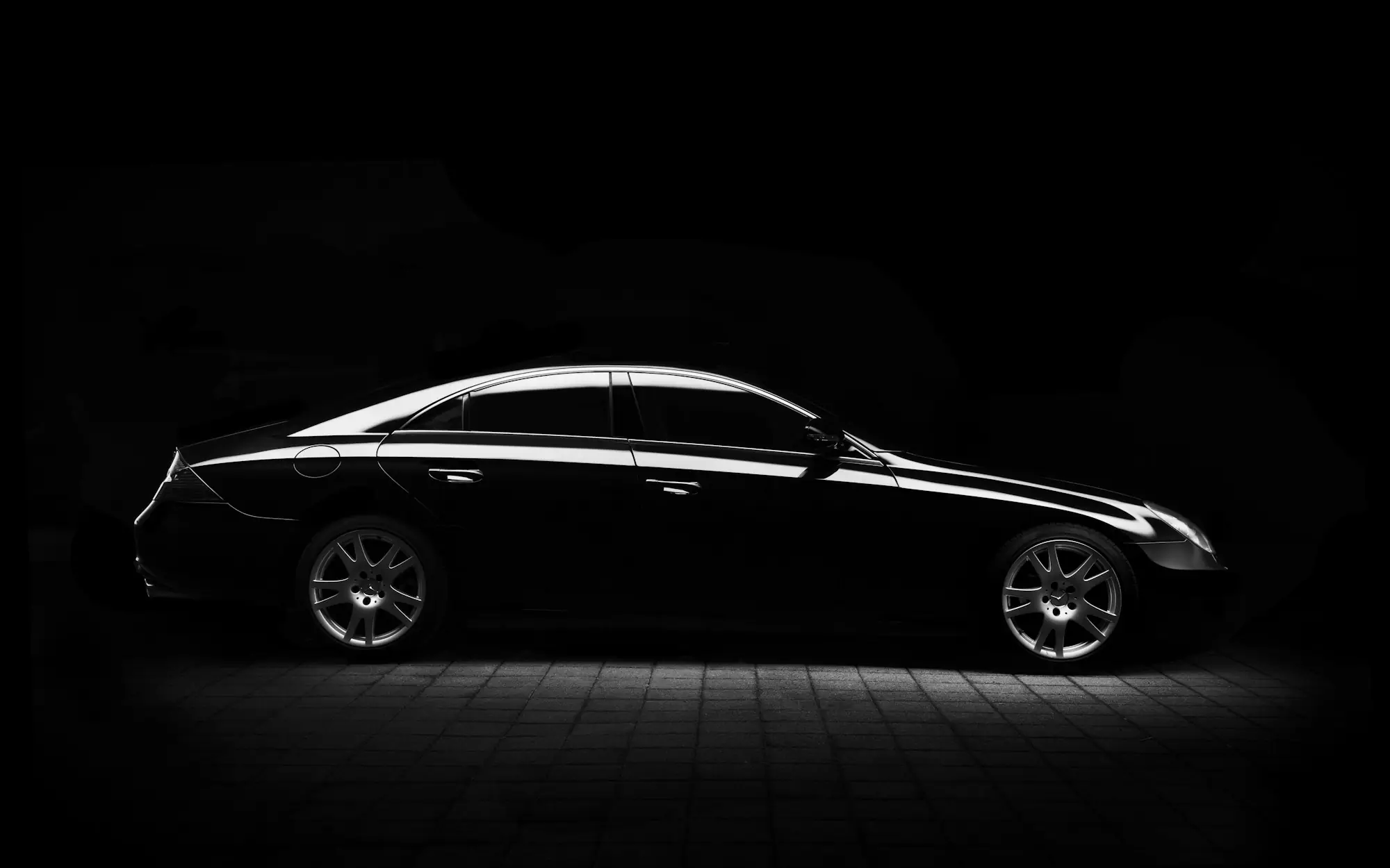 Clean, glossy black sedan